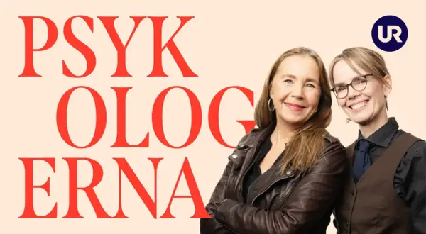 Två leende kvinnor framför texten "Psykologerna". Kanske diskuterar de psykolog utbildning krav.